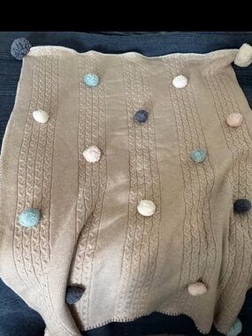 Pottery Barn Kids cozy knit Pom-pom blanket